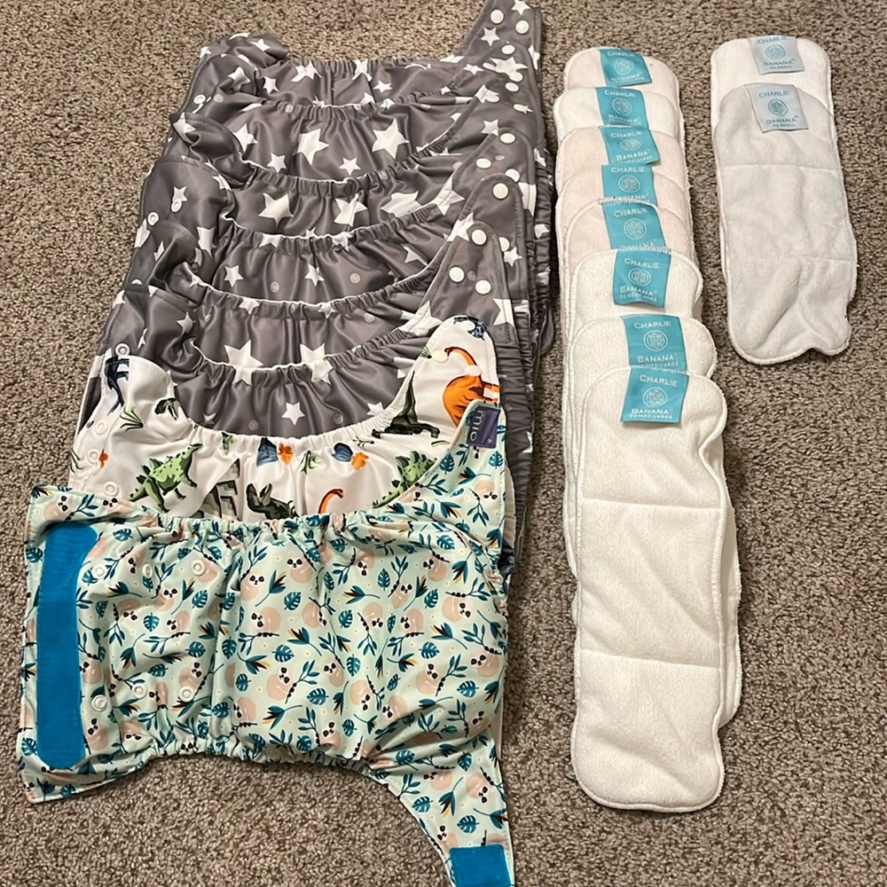 8 NEVER USED reusable diapers, one size, gender neutral with 10 extra inserts